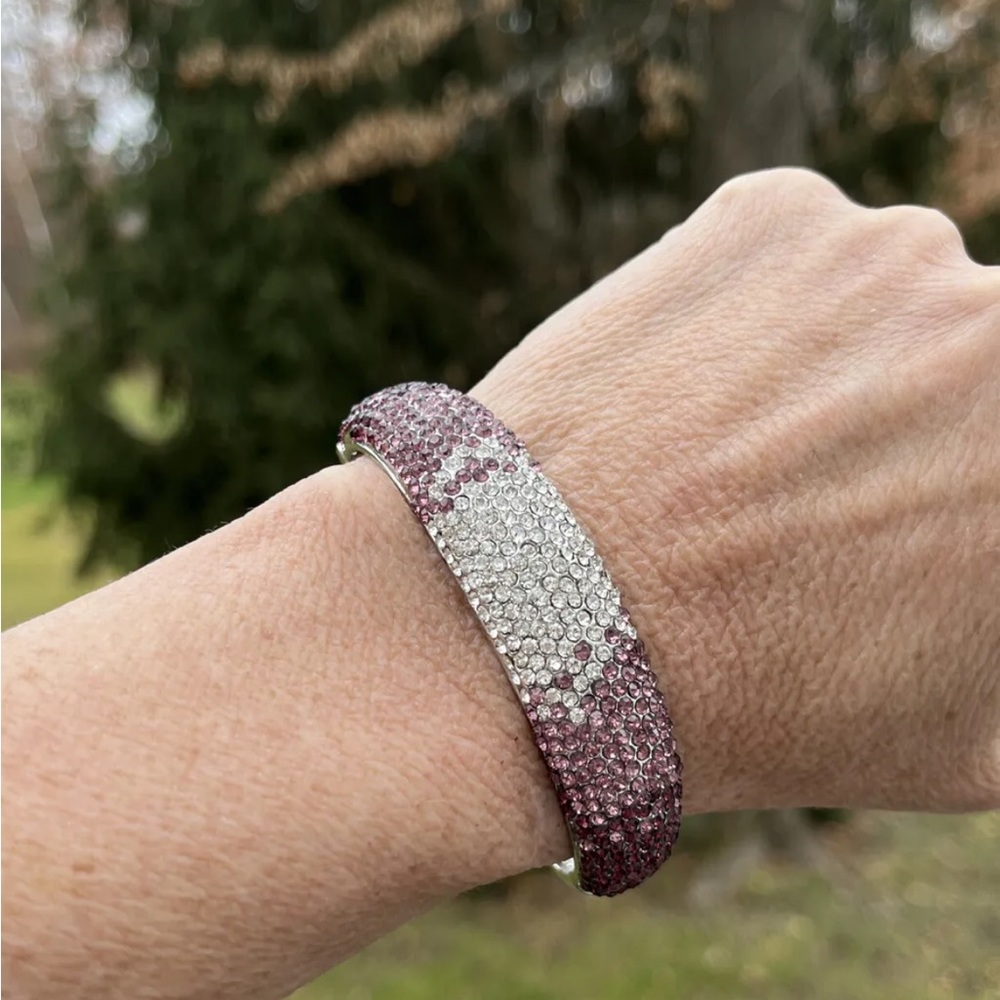 Silver tone bracelet with pink purple white tone Chrystal gemstones. Size 7.8